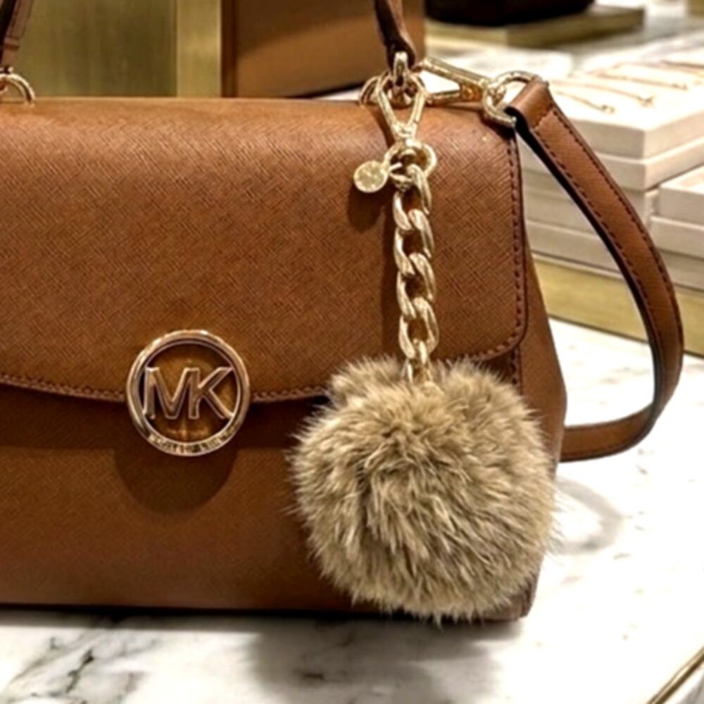 Michael Kors Fur Pom Pom Bag Charm fluffy tan furry ball gold-tone chain link